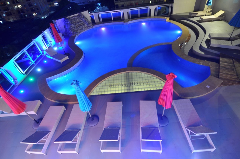 Benin Royal Hotel rooftop pool at dusk